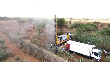 Machine-Drilling-Water-Borehole-in-Masai-Village-in-Loitokitok,-Kenya