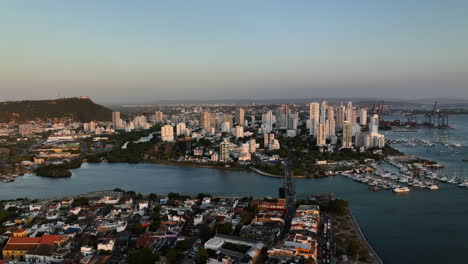 Aerial-view-of-the-Manga-district,-sunny-evening-in-Cartagena,-Colombia---tracking,-drone-shot
