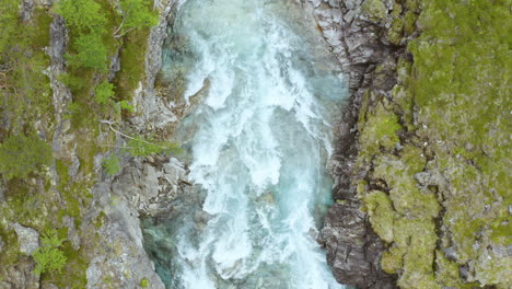 Top-Down-View-Of-Rapids-Of-Mountain-River-With-Wet-Boulders-In-Stryn,-Norway---aerial-drone-shot