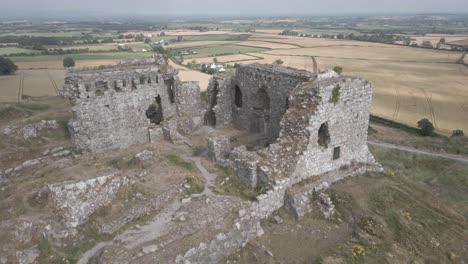 The-Rock-Of-Dunamase-In-County-Laois,-Ireland-With-Surrounding-Farmlands---aerial-drone-shot