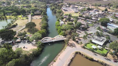 drone-aerial-panning-view-of-the-haleiwa-bridge-on-oahu-hawaii