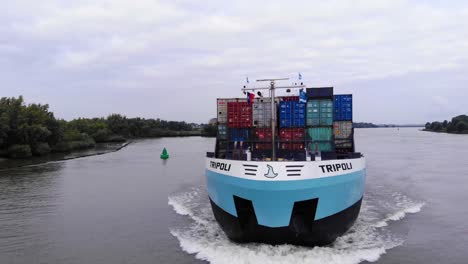 Aerial-Across-Forward-Bow-Of-Tripoli-Cargo-Ship-On-Oude-Maas