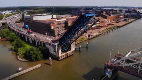 Bridge-Over-The-River-Noord-At-Alblasserdam-Is-Opening-In-The-Netherlands---aerial-view