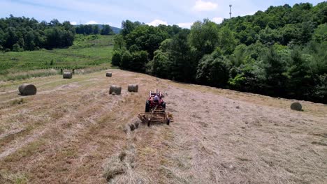Farmer-Rakes-Hay-in-Ashe-County-NC