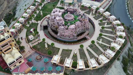Aerial-view-over-the-Al-Khulb-Park,-in-Al-Baha,-Saudi-Arabia---tilt,-drone-shot