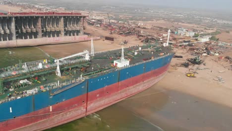 Aerial-View-Of-Beached-Tanker-Ship-At-Beach-At-Gaddani-In-Pakistan