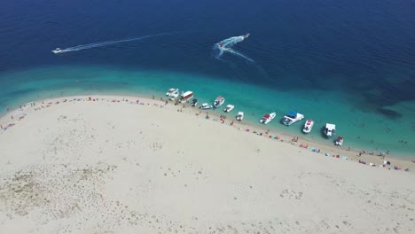 Aerial-drone-view-of-iconic-small-uninhabited-island-of-Marathonisi,-Zakynthos
