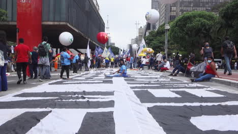Tilt-up-over-huge-banner-on-Sao-Paulo-street-for-Black-Lives-Matter