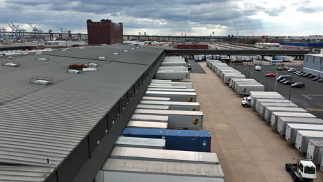 UPS-trailers-lined-up-to-load-unload-at-terminal-distribution-center-dock