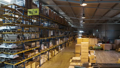Warehouse-area-13-and-14-with-packed-boxes-stacked-in-shelves,aerial