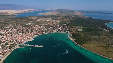 Panoramic-View-On-The-Touristic-Town-Of-Novalja-On-The-Island-Of-Pag,-Croatia---aerial-drone-shot