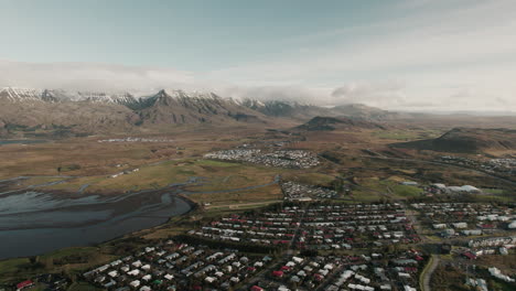 Slow-aerial-tilt-up-above-Reykjavik,-Iceland