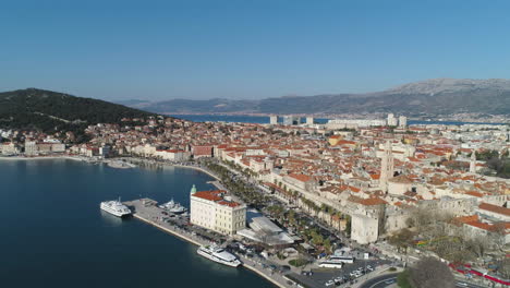 Aerial-Orbit-Around-The-Port-Of-Split,-Croatia-With-City-Buildings