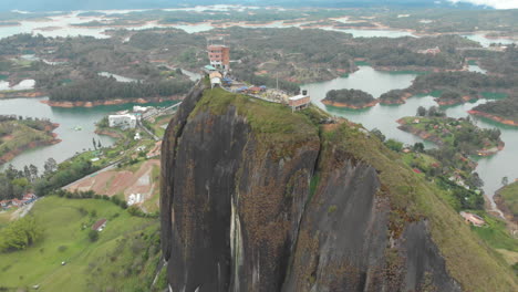 The-Rock-of-Guatapé-or-El-Peñón-de-Guatapé---Tourist-site-of-Colombia---aerial-drone-shot