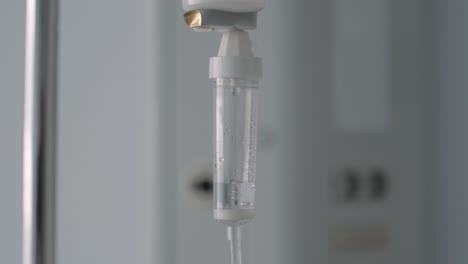 Handheld-motion-intravenous-drip-equipment,-Medical-treatment-concept---Close-up