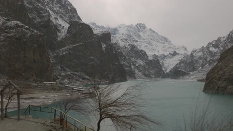 Looking-Out-From-Viewpoint-Across-River-To-Snow-Capped-Mountains-At-Hunza-Valley