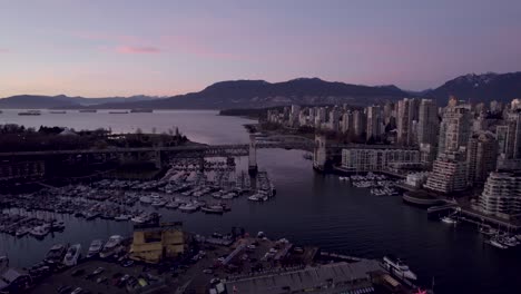 Burrard-Bridge-and-cityscape-at-sunset,-Vancouver-district,-British-Columbia-in-Canada