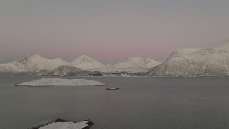 Snowy-Mountain-Peaks-In-Northern-Norway-Fjord-Scenery-At-Dusk,-Aerial