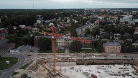 Drone-shot-of-building-Tartu-university-Delta-Centre,-panoramic-view-of-Tartu-and-Narva-mnt