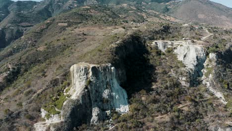 Aerial-view-of-Hierve-el-Agua-natural-travertine-rock-formations-in-Oaxaca,-Mexico