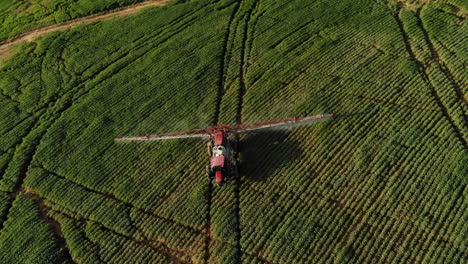 Tractor-spraying-soybean-plantation-in-Brazil
