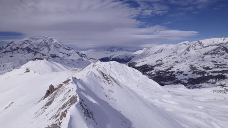 Amazing-Aerial-View-of-the-Snow-Covered-Alps---Dolly-In-Shot---Shot-in-Tignes-and-Val-d'Isere