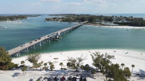 gorgeous-orbiting-aerial-of-the-boating-activity-near-Longboat-Pass-and-Jewfish-Key-in-Sarasota,-Florida