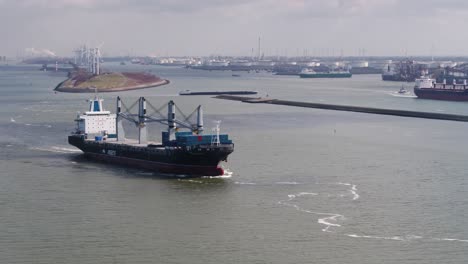 Empty-container-ship-cruising-at-Rotterdam-port,-Netherlands