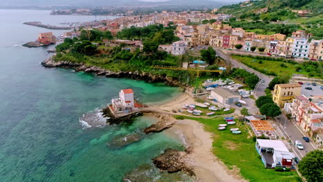 Beautiful-Old-Architecture-And-Coastal-View-Of-Santa-Flavia-In-Italy---aerial-shot