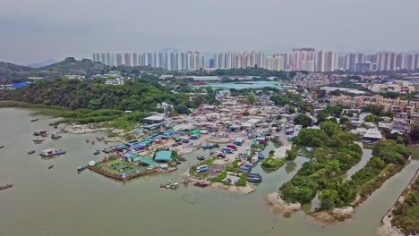 A-dynamic-ascending-aerial-footage-of-the-fishing-village-in-Lau-Fau-Shan-in-the-New-Territories-of-Hong-Kong