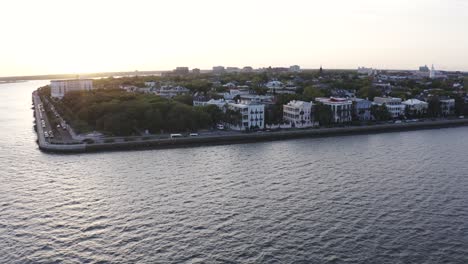 Sweeping-Drone-Charleston-South-Carolina-Cityscape,-Downtown-at-Sunset