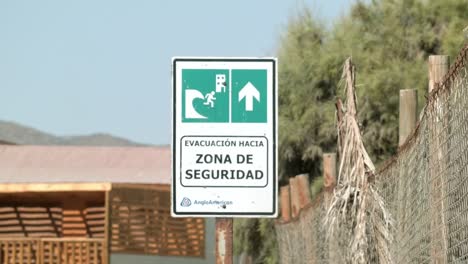 Evacuation-To-Security-Zone-Signboard-In-Spanish-Language-In-Chile