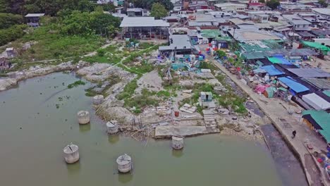 A-dynamic-orbiting-aerial-footage-of-the-fishing-village-in-Lau-Fau-Shan-in-in-the-New-Territories-of-Hong-Kong