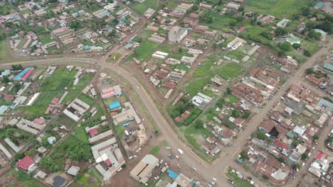 Aerial-top-down-on-street-traffic-residential-district-of-Loitokitok-town,-Kenya