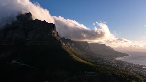 Clouds-enveloping-the-Twelve-Apostles-at-sunset,-Cape-Town