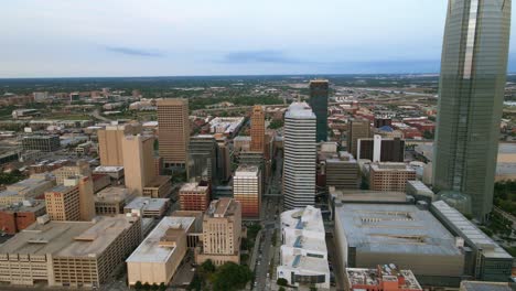 High-rise-in-Downtown-Oklahoma-city,-sunrise-in-USA---Aerial-wide-panoramic-view