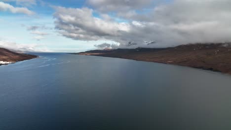 Idyllic-Faskrudsfjordur-Fjord-In-East-Iceland---aerial-drone-shot