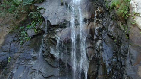 Tropical-Waterfall-Cascading-On-Rocky-Boulder-In-Yelapa