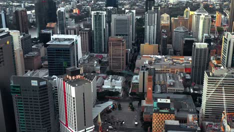 Fly-Over-King-George-Square-Park-With-City-Hall-Clock-Tower-In-Brisbane-CBD,-Queensland-Australia