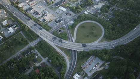 Rotating-Aerial-Hyperlapse-of-an-exit-of-the-highway-I-24-in-Chattanooga,-TN-with-high-traffic