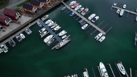 Aerial-Overhead-circling-shot-of-Tonnes-Harbor-in-Helgeland,-Northern-Norway,-Europe