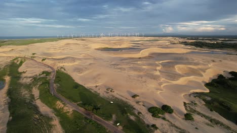 Beautiful-drone-take-of-dunes-in-northeast-brazil-at-dusk,-magic-light