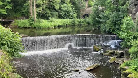 Man-made-waterfall-in-the-town-of-Newmills-in-the-Derbyshire-Peak-District