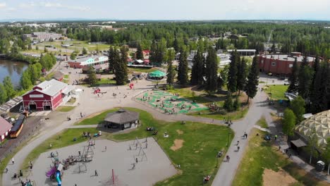 4K-Drone-Video-of-Tanana-Valley-Railroad-at-Pioneer-Park-in-Fairbanks,-AK-during-Summer-Day