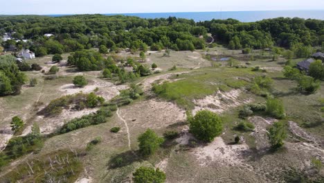 Drone-aerial-of-a-sand-grass-and-dune-area-in-Muskegon