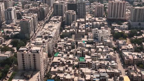 Aerial-Flying-Over-Densely-Packed-Buildings-In-Karachi