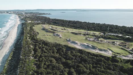 Drone-flying-over-Magenta-Shores-golf-course-between-Magenta-beach-and-Tuggerah-lake