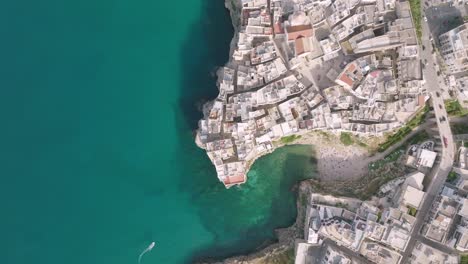 Wide-aerial-top-down-footage-of-Polignano-a-Mare-in-Italy