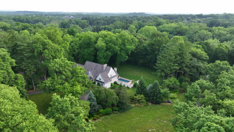 Aerial-view-of-suburban-mansion-backyard-pool