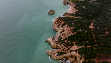 Flying-over-the-Algarve-coast-on-a-moody-day-with-a-drone